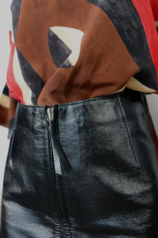 Scanlan Theodore black leather mini skirt with front zip high waisted AU6.
