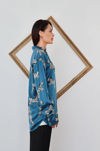 Olivia von Halle blue zebra print silk pyjama set with contrast piping and relaxed fit.