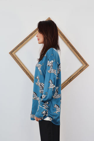 Olivia von Halle blue zebra print silk pyjama set with contrast piping and relaxed fit.