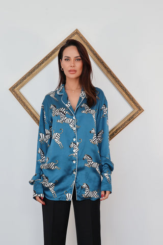 Olivia von Halle blue zebra print silk pyjama set with contrast piping and relaxed fit.