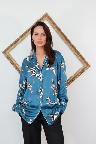 Olivia von Halle blue zebra print silk pyjama set with contrast piping and relaxed fit.