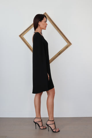Maje black cape mini dress with grey sheer front panel and open back detail