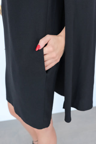 Maje black cape mini dress with grey sheer front panel and open back detail