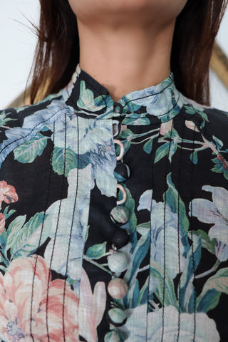 Zimmermann Verity Rouleau Short Floral Dress with floral print, high neckline, fabric-covered buttons, balloon sleeves, and self-tie waist belt.