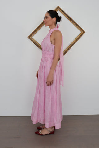 Zimmermann pink halter-neck midi dress with flowing skirt, shown on model.