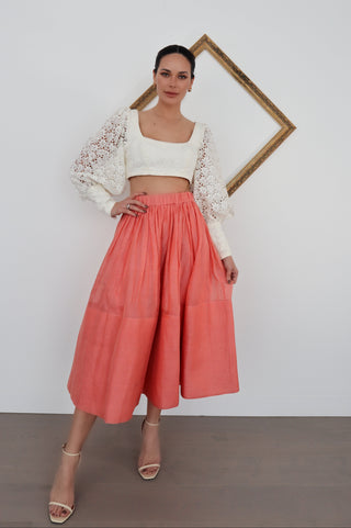 Zimmermann pink linen midi skirt in size 0 shown on model