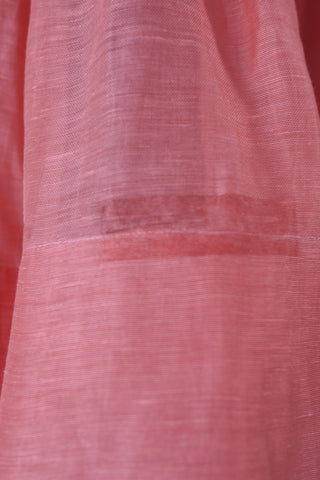 Zimmermann pink linen midi skirt in size 0 shown on model