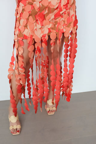 Acler Thurston Crop Top and Miranda Fringe Skirt Set Amber Bloom orange appliqué two-piece set with puff sleeves and cascading fringe detailing.