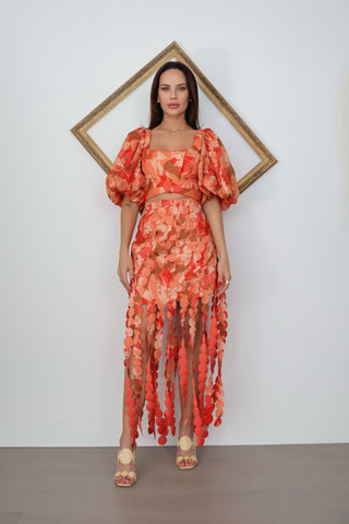Acler Thurston Crop Top and Miranda Fringe Skirt Set Amber Bloom orange appliqué two-piece set with puff sleeves and cascading fringe detailing.