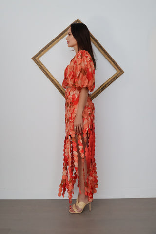 Acler Thurston Crop Top and Miranda Fringe Skirt Set Amber Bloom orange appliqué two-piece set with puff sleeves and cascading fringe detailing.