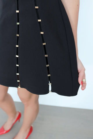 Acler Rossgreen Mini Dress black strapless crepe mini dress with gold-tone bar seam embellishments and exposed zip back detail.