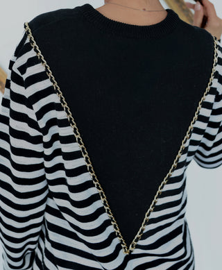 Balmain black and white striped pullover with chain detail.