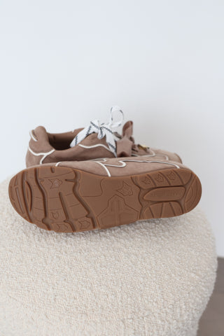 Naked Wolfe Adored sneakers in Mushroom suede, EU Size 40, featuring white contrast piping, oversized satin bow laces, logo-patterned laces, gold-tone hardware and chunky gum platform soles.