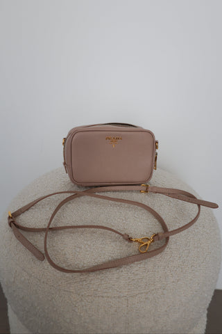 Prada Saffiano Lux Small Camera Crossbody Bag, beige (Cipria), gold-tone hardware.