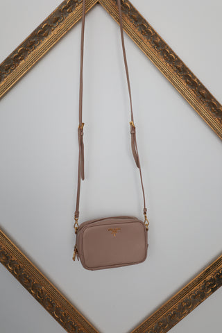 Prada Saffiano Lux Small Camera Crossbody Bag, beige (Cipria), gold-tone hardware.