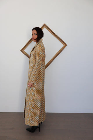 Zimmermann gold and grey quilted longline coat photographed on model for Luxury Kulture.