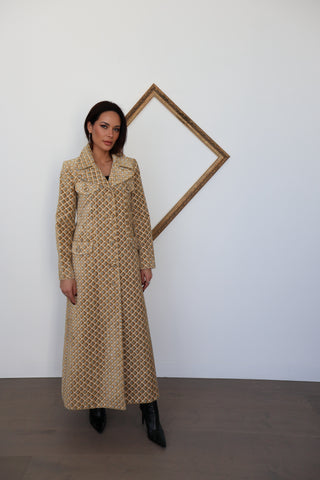 Zimmermann gold and grey quilted longline coat photographed on model for Luxury Kulture.